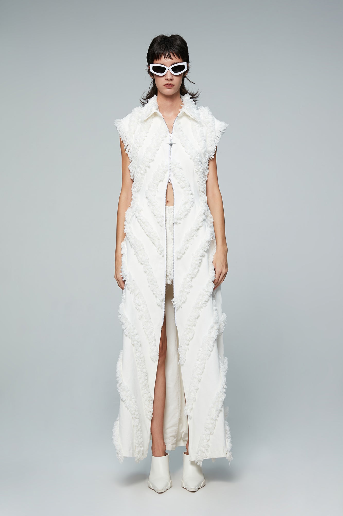 Long denim coat with fritted edges