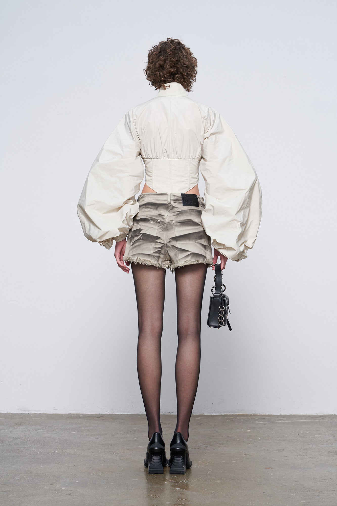 Futuristic fishbone pleated jacket