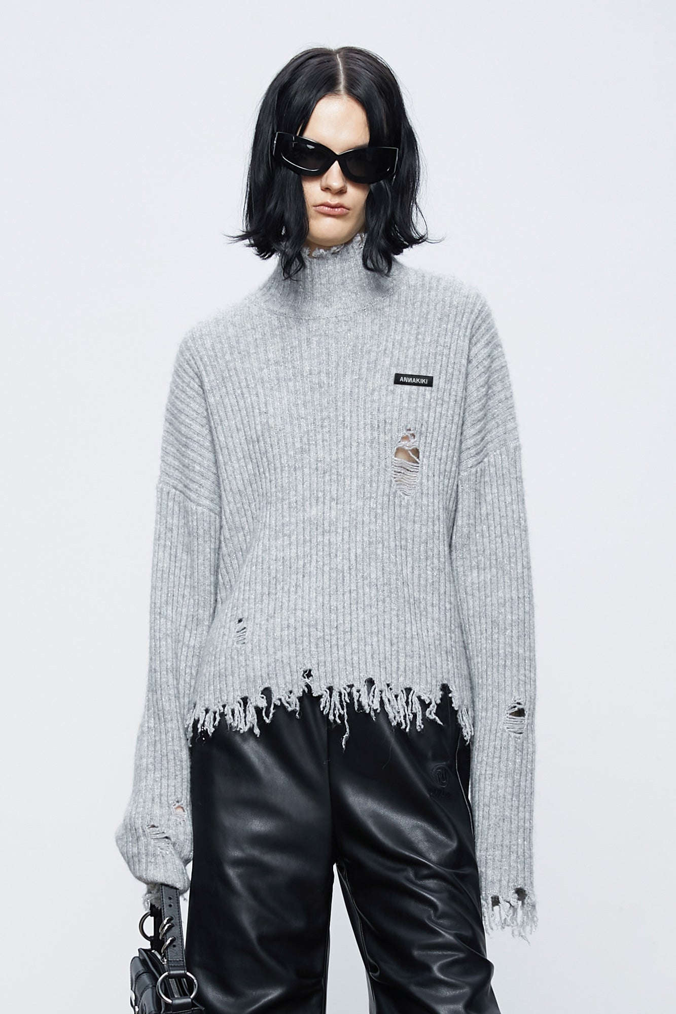 Wool turtleneck ripped sweater