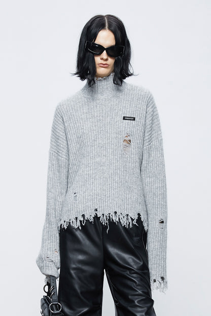 Wool turtleneck ripped sweater