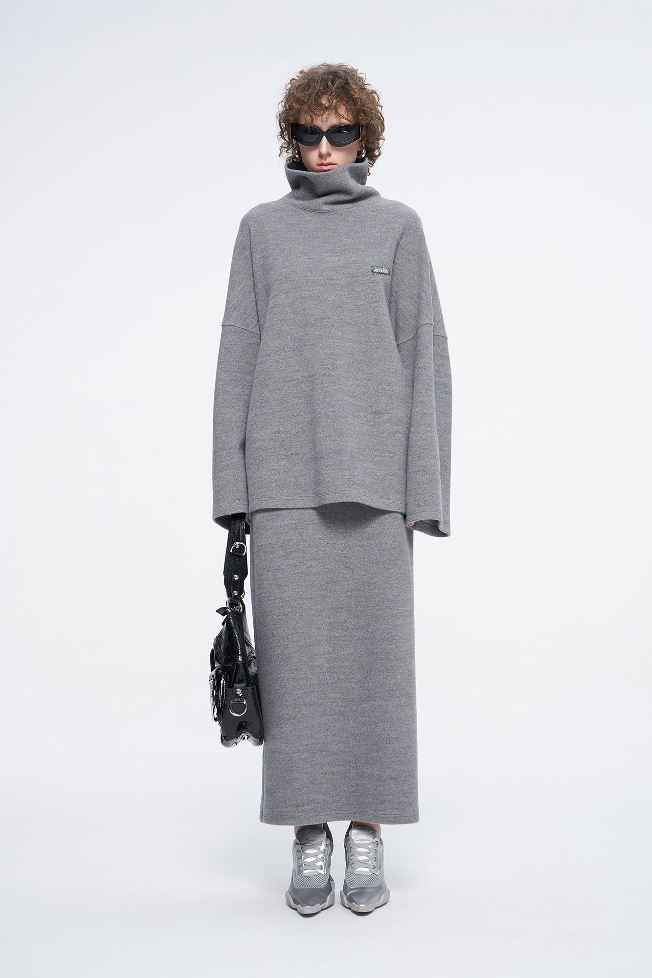 high-necked sweater with a loose silhouette