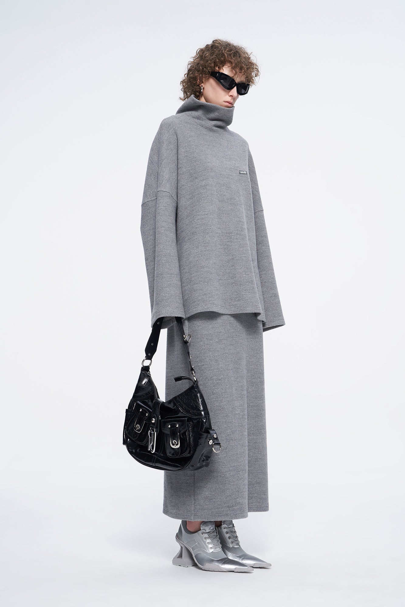 high-necked sweater with a loose silhouette