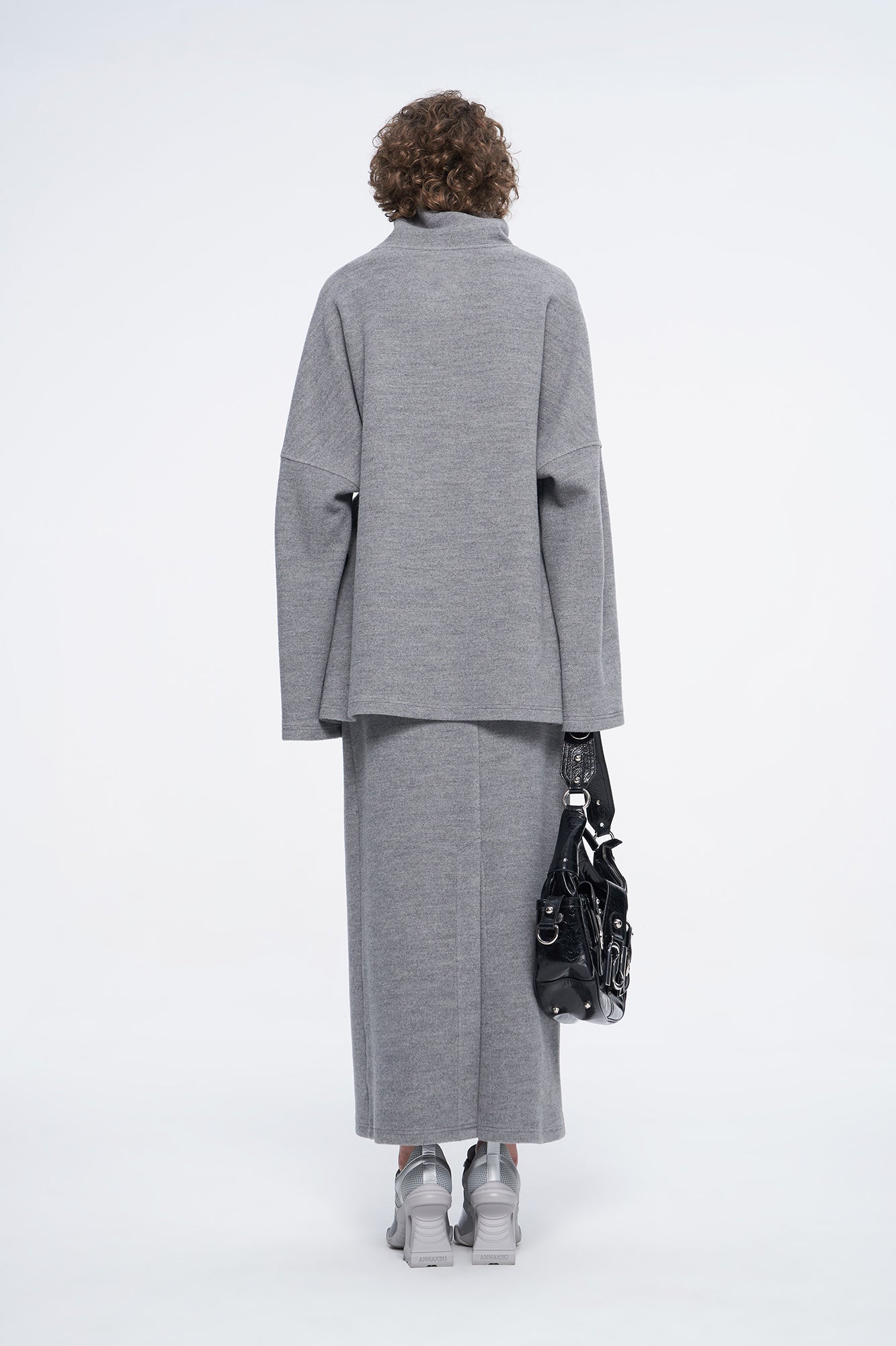 high-necked sweater with a loose silhouette