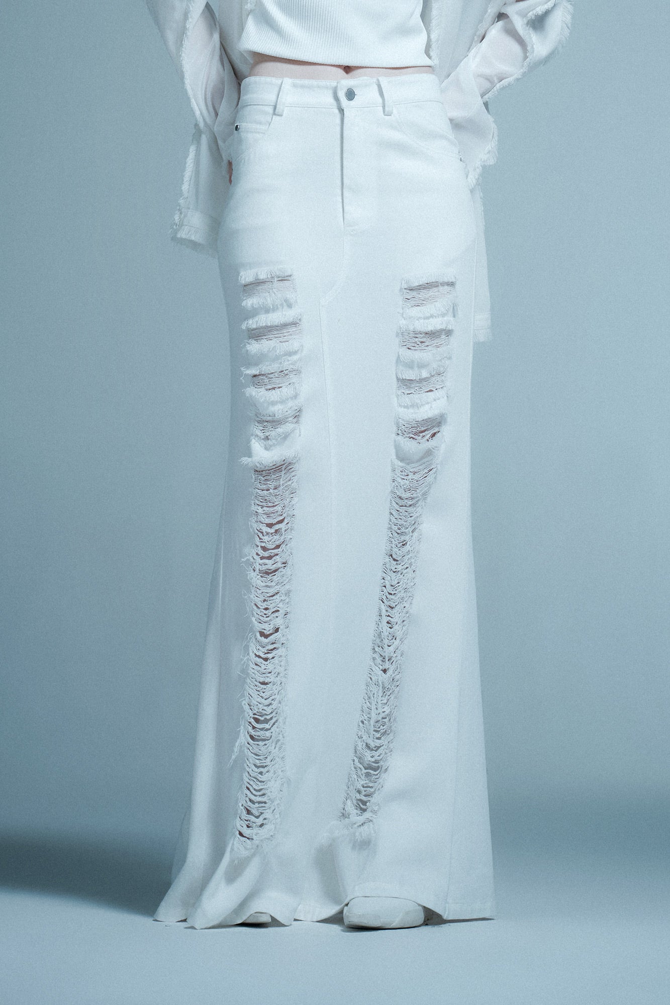 Ripped denim fishtail skirt