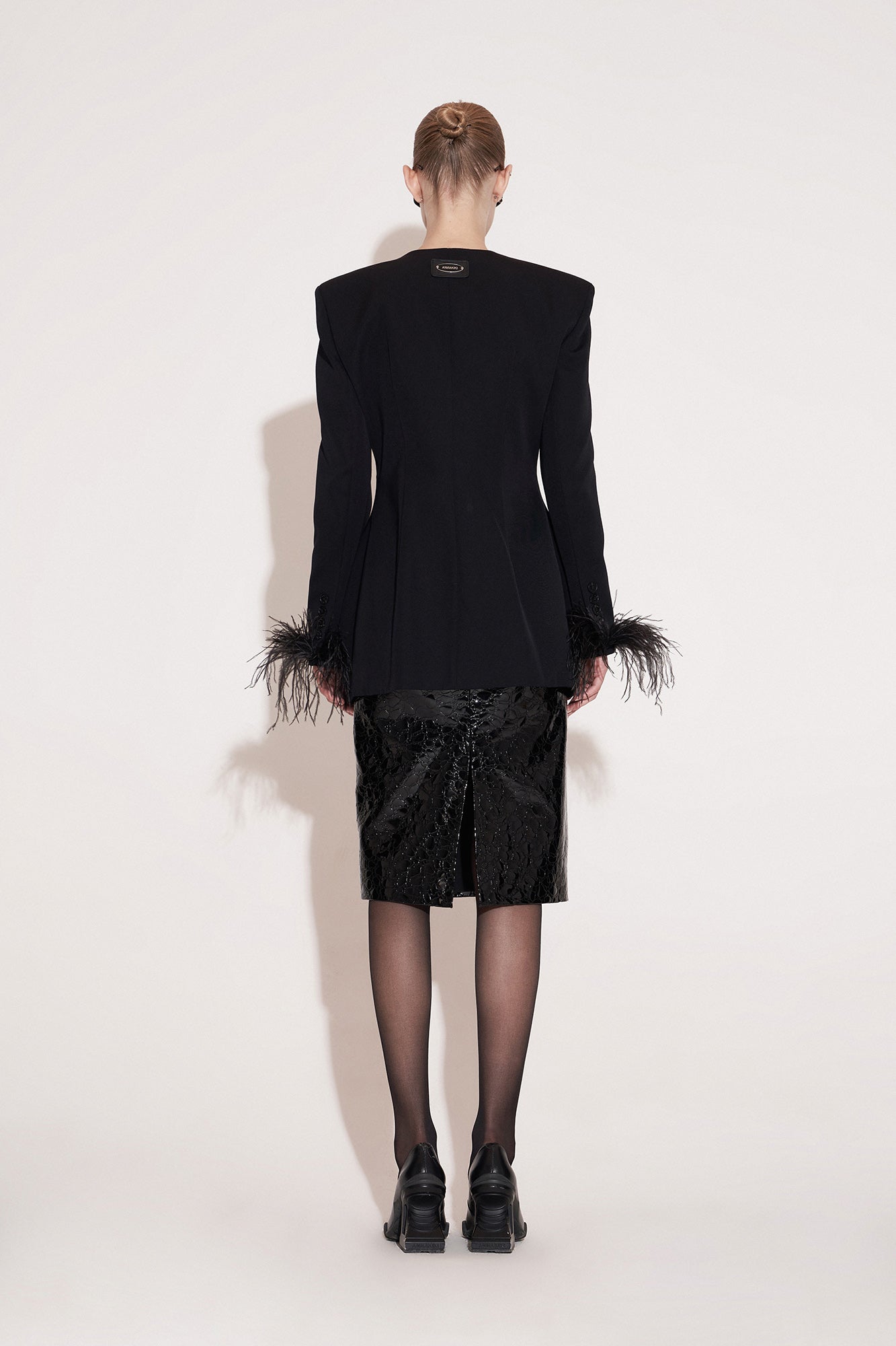 Wool geometric segmentation feather suit