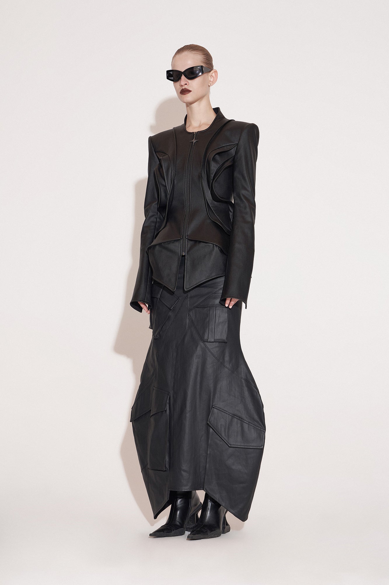 Multi-layer flying piece architectural coat