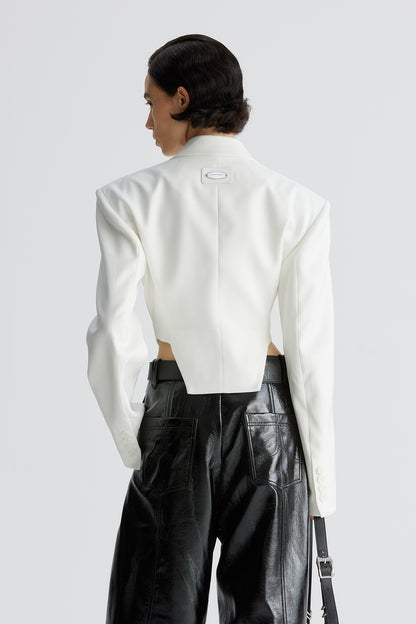 Shoulder cushion curved hem suit